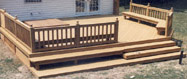 Wooden Deck by Elyria Fence